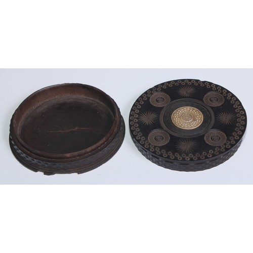 655 - An early 19th century engine turned lignum vitae table snuff box, the push-fitting cover centred by ... 