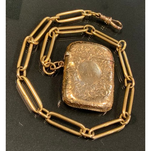 715 - An 18ct gold  fancy link albert chain, 35.4cm long, 38.9g;  suspending a 9ct gold vesta case, 16.1g