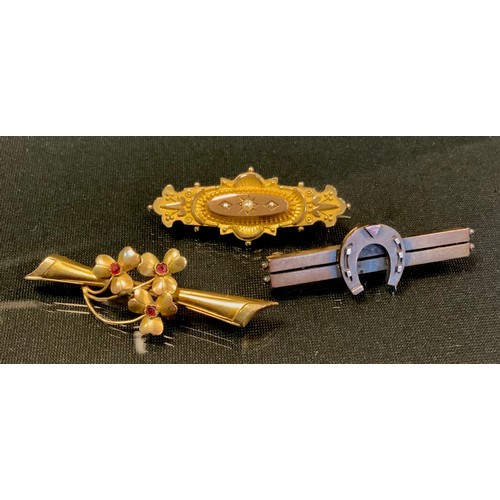 729 - A Victorian 9ct gold seed pearl mourning brooch, Birmingham 1875, another floral, 4.5g gross;  an in... 