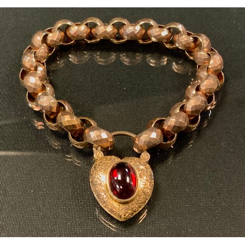 735 - A Victorian facetted link mourning bracelet, with oval cabochon foil backed garnet set heart shape p... 