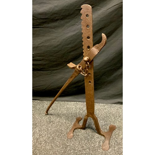 674 - A 19th century blacksmiths hand made horse cart/wagon lifting jack, eight holed stand, lock tooth ed... 