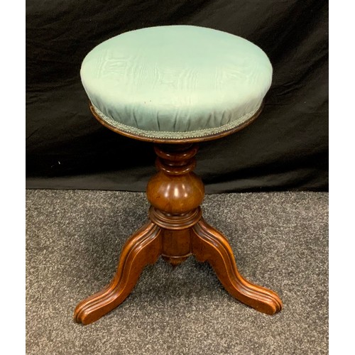 688 - A Victorian walnut piano stool, upholstered seat, carved tripod supports, height range from approx 5... 