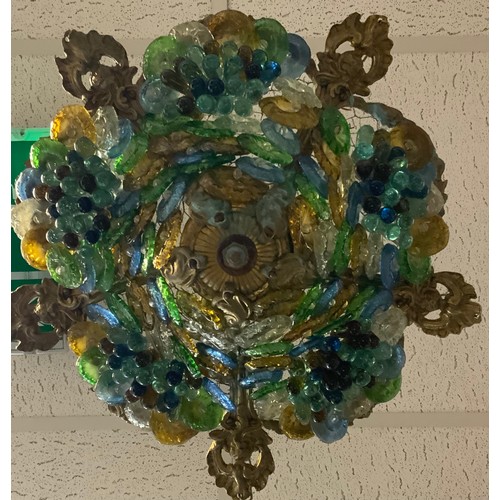 686 - A 20th century Murano glass pendant light fitting, as flowers and grapes, principally in tones of am... 