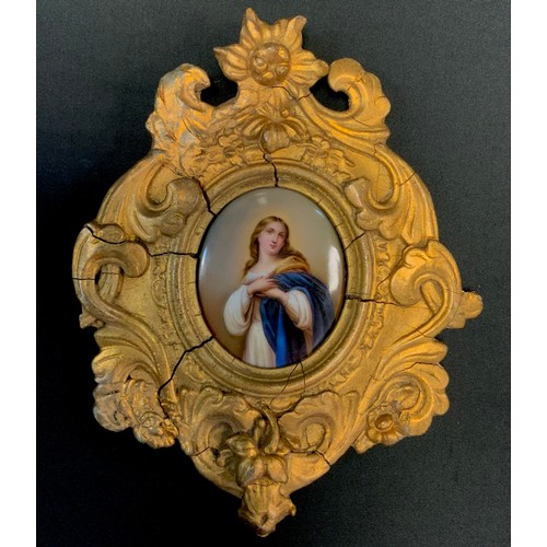 141 - After Bartolome Esteban Murillo, a porcelain miniature, Virgin Mary,  oval, 8cm x 6.5cm, gilt Floren... 