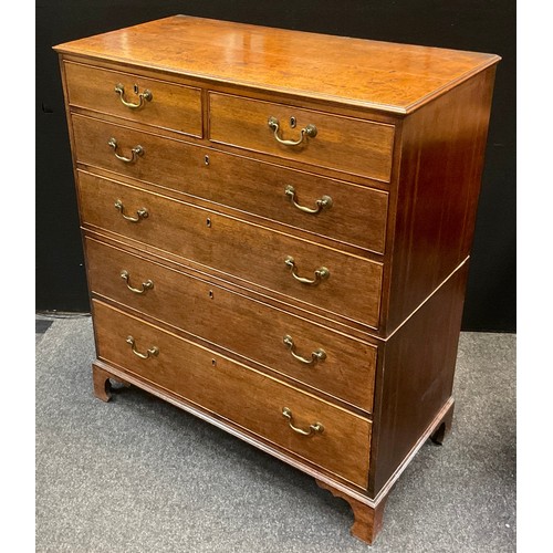 221 - A George III style oak chest, two short over four long graduated drawers, swan neck brass handles, b... 