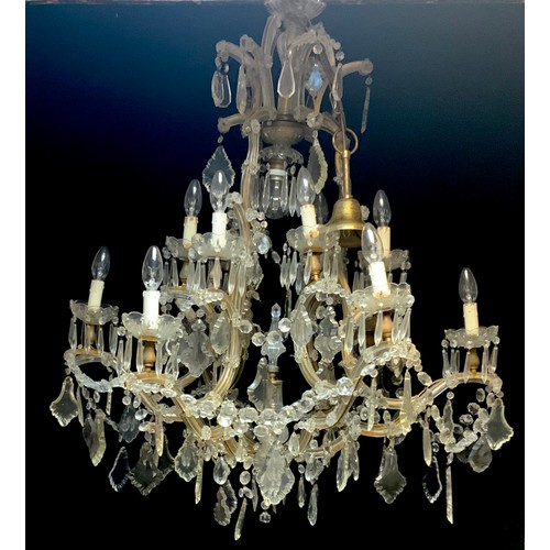 689 - A large Venetian style six branch tubular glass chandelier, suspended with faceted swaps and droplet... 