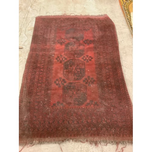 815 - A Middle Eastern rectangular wool rug or carpet, 190cm x 137cm