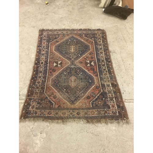 818 - A Middle Eastern rectangular wool rug or carpet, 156cm x 123cm