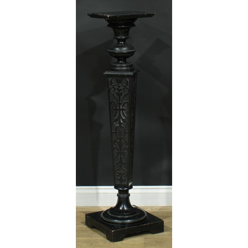 895 - A 19th century ebonised statuary pedestal, square plateau, tapered blind fretwork column, turned soc... 