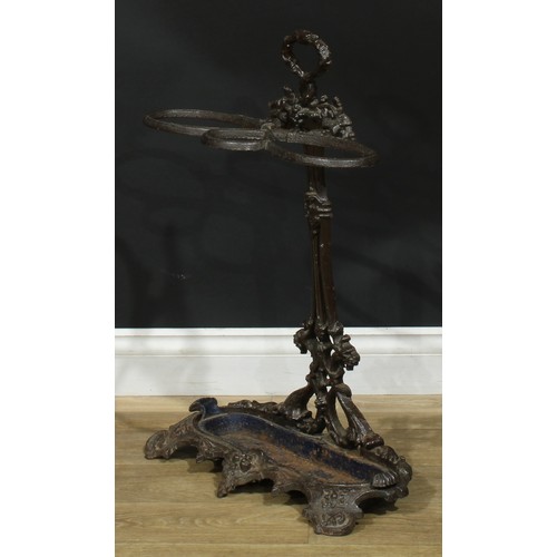 1456 - A Victorian cast iron walking stick or umbrella stand, drip tray to base, 72cm high, 50cm wide, c.18... 