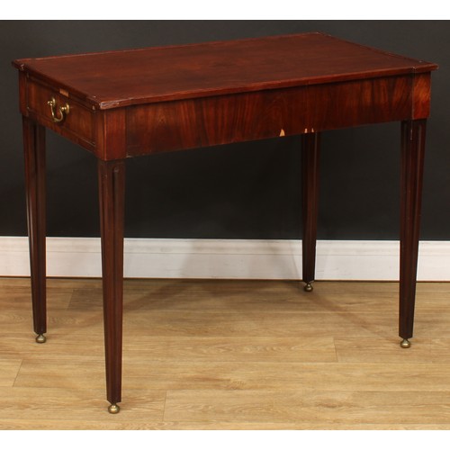 1230 - A George III mahogany silver table, angular hipped rectangular top above a cockbeaded frieze drawer,... 