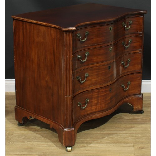 1228 - A George III mahogany serpentine secretaire chest, slightly oversailing top with moulded edge above ... 