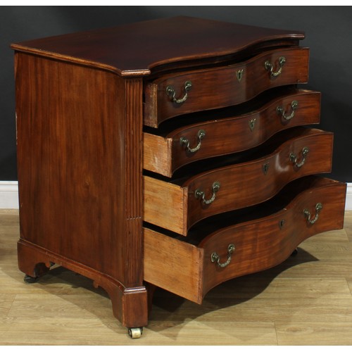 1228 - A George III mahogany serpentine secretaire chest, slightly oversailing top with moulded edge above ... 