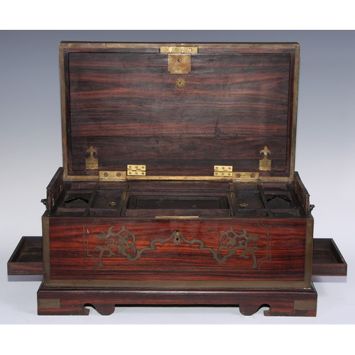 1062 - A 19th century Anglo-Indian brass mounted and marquetry teak table box, hinged cover enclosing an ar... 