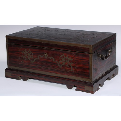 1062 - A 19th century Anglo-Indian brass mounted and marquetry teak table box, hinged cover enclosing an ar... 