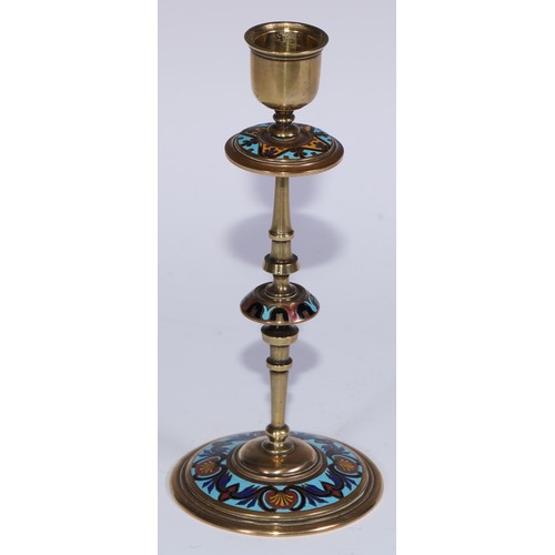 1187 - A pair of French champlevé enamel candlesticks, decorated in polychrome on a turquoise ground, 19.5c... 