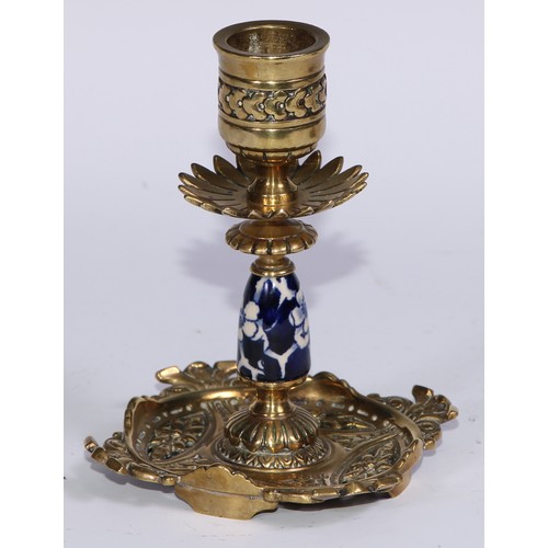 1391 - A pair of Aesthetic Movement gilt brass and earthenware candlesticks, cast and decorated in the Japa... 