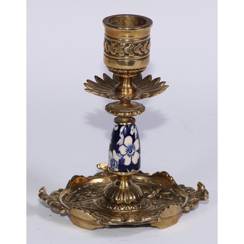 1391 - A pair of Aesthetic Movement gilt brass and earthenware candlesticks, cast and decorated in the Japa... 