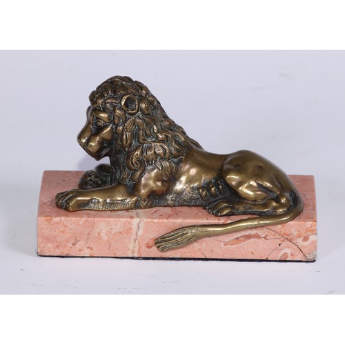 1462 - French School, 19th century, a pair of bronzes, recumbent lions, facing to dexter and sinister, marb... 