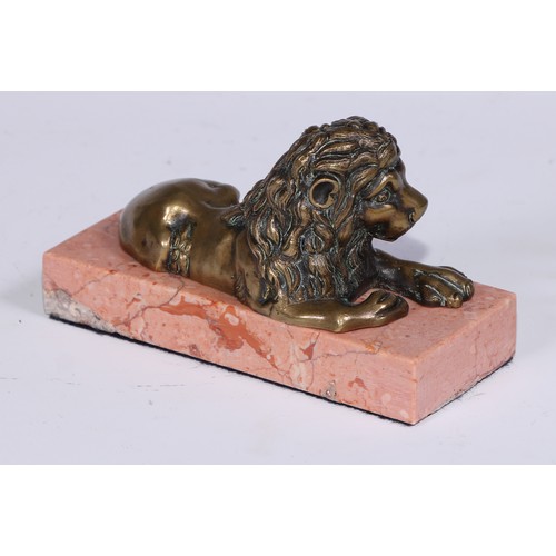 1462 - French School, 19th century, a pair of bronzes, recumbent lions, facing to dexter and sinister, marb... 