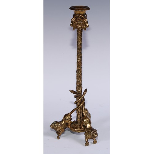 1188 - A pair of French gilt bronze tripod candlesticks, campana sconces with caprine masks, fruiting vine ... 