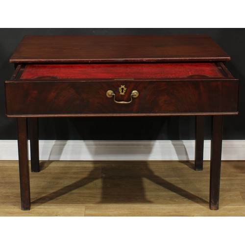 1101 - A George III mahogany architect’s table, rectangular top above a long frieze drawer, fitted with a s... 