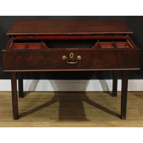 1101 - A George III mahogany architect’s table, rectangular top above a long frieze drawer, fitted with a s... 