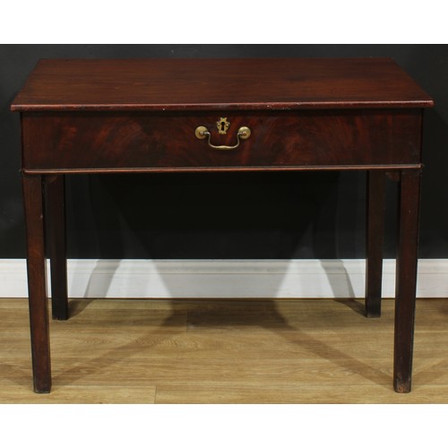 1101 - A George III mahogany architect’s table, rectangular top above a long frieze drawer, fitted with a s... 