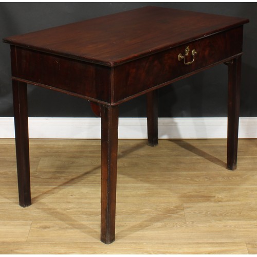 1101 - A George III mahogany architect’s table, rectangular top above a long frieze drawer, fitted with a s... 