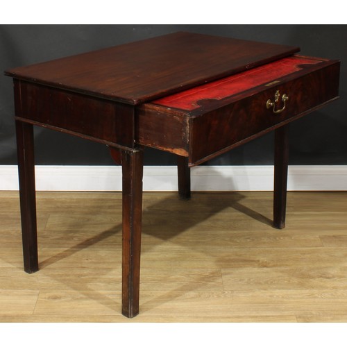 1101 - A George III mahogany architect’s table, rectangular top above a long frieze drawer, fitted with a s... 