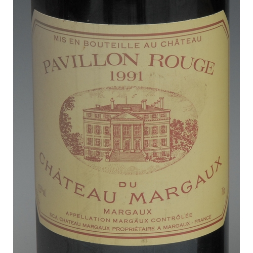 856 - Wine - three bottles, Chateau Margaux Pavillon Rouge 1991, 12.5% vol, 75cl, sealed level at base of ... 