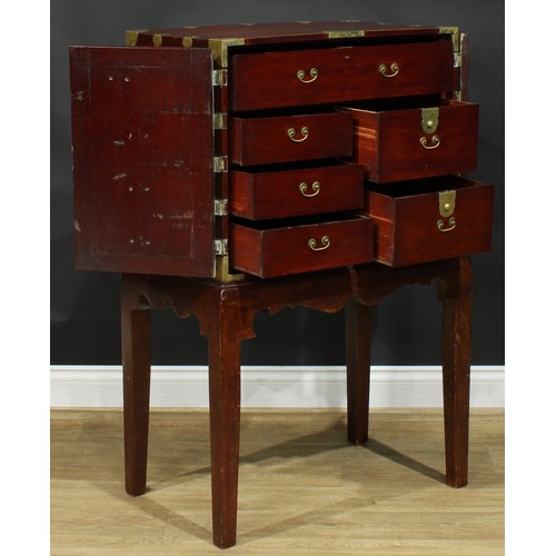 1022 - A Chinese brass mounted yumu and hardwood enclosed collector’s chest, flush rectangular top above a ... 