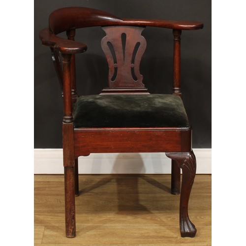 1111 - A George III mahogany corner chair, shaped and pierced splats, drop-in seat, cabriole foreleg, trefi... 