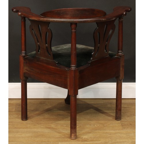 1111 - A George III mahogany corner chair, shaped and pierced splats, drop-in seat, cabriole foreleg, trefi... 