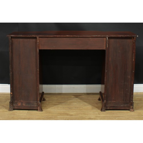 914 - A 19th century mahogany breakfront sideboard, slightly oversailing top with reeded edge above three ... 