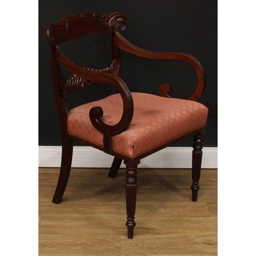 1396 - A pair of George IV mahogany bar-back desk chairs or carvers, each with a curved cresting rail carve... 