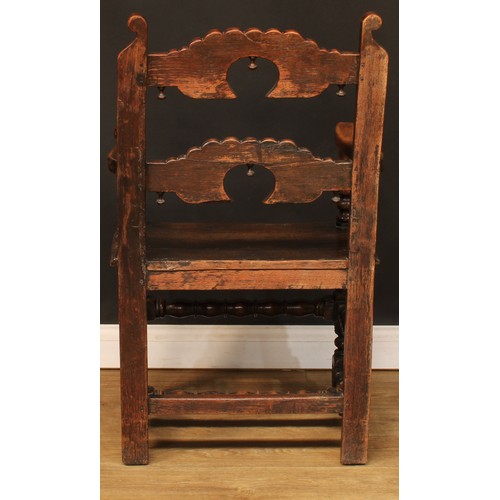 1118 - A set of eight Charles II design oak Derbyshire chairs, comprising six side chairs and a pair of car... 