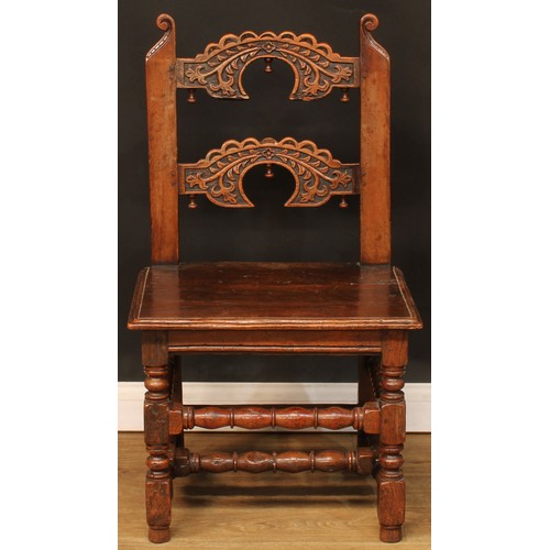 1118 - A set of eight Charles II design oak Derbyshire chairs, comprising six side chairs and a pair of car... 