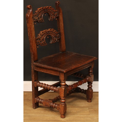 1118 - A set of eight Charles II design oak Derbyshire chairs, comprising six side chairs and a pair of car... 