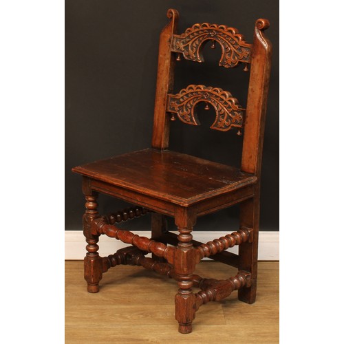 1118 - A set of eight Charles II design oak Derbyshire chairs, comprising six side chairs and a pair of car... 