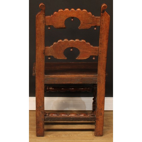 1118 - A set of eight Charles II design oak Derbyshire chairs, comprising six side chairs and a pair of car... 