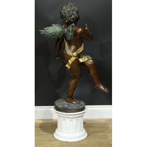 918 - Continental School, a brown patinated and cold painted bronze, of an amorini, 85cm high, marble plin... 