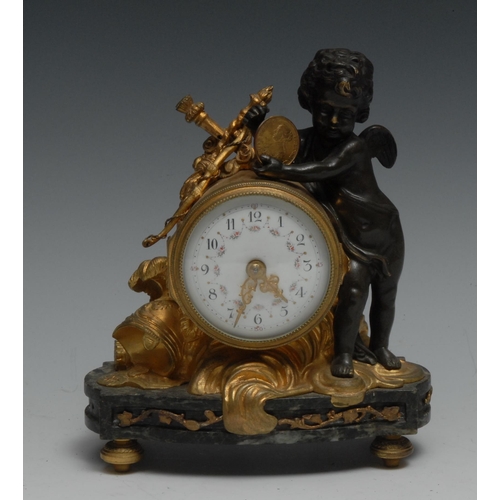 983 - A French gilt and dark patinated bronze mantel timepiece, 6cm enamel clock dial inscribed with Arabi... 