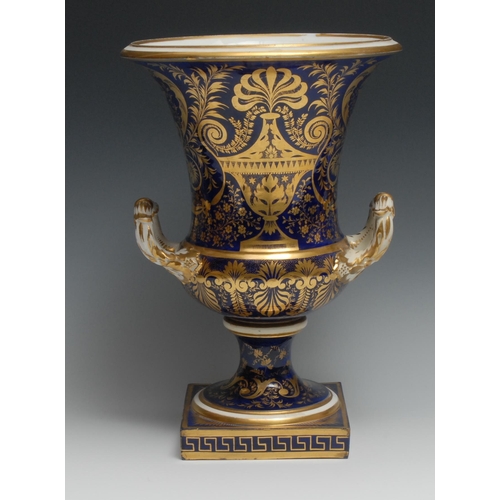 473 - A 19th century Derby two handled campana shaped vase, painted in the manner Richard Dodson, in polyc... 