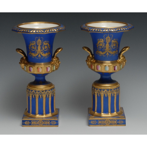 464 - A pair of 19th century Minton pedestal campana vases, painted by Thomas Till, with sailing boats off... 