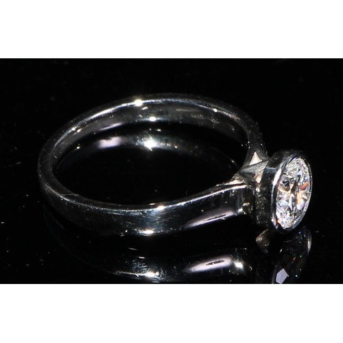 354 - A platinum diamond solitaire ring, approx. 0.6ct, size J, marked 950, 3.85g