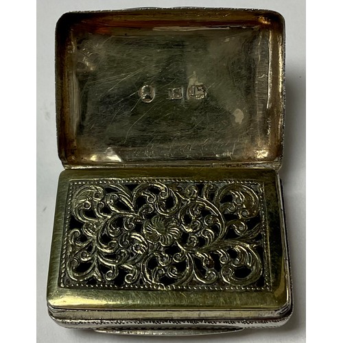 315 - A George IV silver vinaigrette, engraved with leaves, gilded interior with hinged pierced grill, 3.5... 