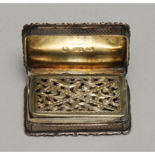 317 - A William IV silver vinaigrette, engraved throughout with acanthus scroll borders, vacant rectangula... 