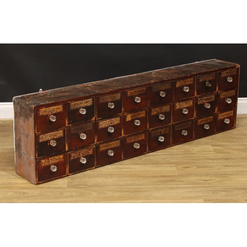 1324 - A late 19th century medicine or apothecary chest, of twenty-four drawers, each labelled, faceted gla... 