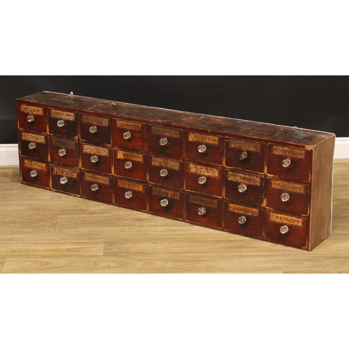 1324 - A late 19th century medicine or apothecary chest, of twenty-four drawers, each labelled, faceted gla... 